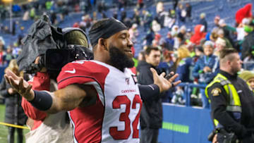 SEATTLE, WA - DECEMBER 22: Defensive back Budda Baker #32 of the Arizona Cardinals celebrates as he leaves the field after a game against the Seattle Seahawks at CenturyLink Field on December 22, 2019 in Seattle, Washington. The Cardinals won 27-13. (Photo by Stephen Brashear/Getty Images)