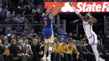 SAN FRANCISCO, CALIFORNIA - FEBRUARY 06: Jordan Poole #3 of the Golden State Warriors shoots over Shai Gilgeous-Alexander #2 of the Oklahoma City Thunder during the third quarter of an NBA basketball game at Chase Center on February 06, 2023 in San Francisco, California. NOTE TO USER: User expressly acknowledges and agrees that, by downloading and or using this photograph, User is consenting to the terms and conditions of the Getty Images License Agreement. (Photo by Thearon W. Henderson/Getty Images)