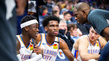 JANUARY 13: Dennis Schroder #17 of the OKC Thunder and Chris Paul #3 talk during the game against the Minnesota Timberwolves (Photo by Zach Beeker/NBAE via Getty Images)