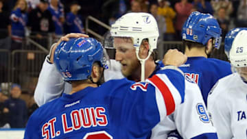 NEW YORK, NY - MAY 29: Martin St. Louis #26 of the New York Rangers hugs Steven Stamkos #91 of the Tampa Bay Lightning after Game Seven of the Eastern Conference Finals during the 2015 NHL Stanley Cup Playoffs at Madison Square Garden on May 29, 2015 in New York City. The Tampa Bay Lightning defeated the New York Rangers 2 to 0. (Photo by Bruce Bennett/Getty Images)