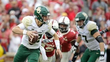 NORMAN, OK - SEPTEMBER 29: Quarterback Charlie Brewer #12 of the Baylor Bears scrambles against the Oklahoma Sooners at Gaylord Family Oklahoma Memorial Stadium on September 29, 2018 in Norman, Oklahoma. Oklahoma defeated Baylor 66-33. (Photo by Brett Deering/Getty Images)