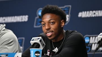 Mar 15, 2023; Des Moines, IA, USA; Texas A&M Aggies guard Wade Taylor IV (4) speaks during the press conference before their opening round game of the NCAA tournament in Des Moines at Wells Fargo Arena. Mandatory Credit: Jeffrey Becker-USA TODAY Sports