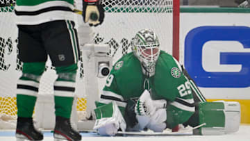Apr 17, 2023; Dallas, Texas, USA; Dallas Stars goaltender Jake Oettinger (29) makes a save on a Minnesota Wild shot during the first overtime period in game one of the first round of the 2023 Stanley Cup Playoffs at the American Airlines Center. Mandatory Credit: Jerome Miron-USA TODAY Sports