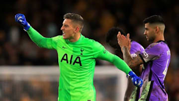 Tottenham Hotspur's Italian goalkeeper Pierluigi Gollini celebrates after a penalty shoot out during the English League Cup third round football match between Wolverhampton Wanderers and Tottenham Hotspur at the Molineux stadium in Wolverhampton, central England on September 22, 2021. - (Photo by LINDSEY PARNABY/AFP via Getty Images)