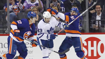 NEW YORK, NY - MARCH 30: John Tavares #91 of the New York Islanders hits Nazem Kadri #43 of the Toronto Maple Leafs during the third period at the Barclays Center on March 30, 2018 in the Brooklyn borough of New York City. (Photo by Bruce Bennett/Getty Images)