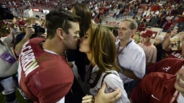 Oct 19, 2013; Tuscaloosa, AL, USA; Alabama Crimson Tide quarterback A.J. McCarron (10) kisses his girlfriend Katherine Webb following their 52-0 victory over the Arkansas Razorbacks at Bryant-Denny Stadium. Mandatory Credit: John David Mercer-USA TODAY Sports