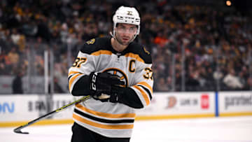 Mar 1, 2022; Anaheim, California, USA; Boston Bruins center Patrice Bergeron (37) looks on during the third period against the Anaheim Ducks at Honda Center. Mandatory Credit: Orlando Ramirez-USA TODAY Sports