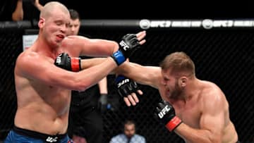 HAMBURG, GERMANY - JULY 22: (R-L) Marcin Tybura of Poland punches Stefan Struve of The Netherlands in their heavyweight bout during the UFC Fight Night at Barclaycard Arena on July 22, 2018 in Hamburg, Germany. (Photo by Jeff Bottari/Zuffa LLC/Zuffa LLC via Getty Images)