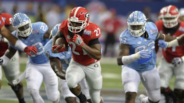 Sep 3, 2016; Atlanta, GA, USA; Georgia Bulldogs running back Nick Chubb (27) runs the ball against the North Carolina Tar Heels during the first quarter of the 2016 Chick-Fil-A Kickoff game at Georgia Dome. Mandatory Credit: Dale Zanine-USA TODAY Sports