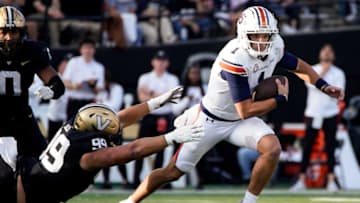 Auburn footballAuburn quarterback Payton Thorne (1) runs past Vanderbilt defensive lineman Devin Lee (99) during the first quarter at FirstBank Stadium in Nashville, Tenn., Saturday, Nov. 4, 2023.