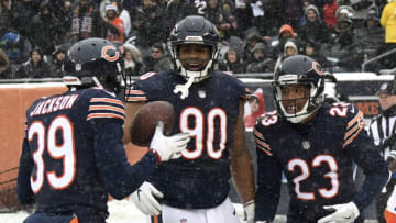 CHICAGO, IL - DECEMBER 24: Jonathan Bullard #90 and Kyle Fuller #23 of the Chicago Bears celebrate after Fuller intercepted the football in the second quarter against the Cleveland Browns at Soldier Field on December 24, 2017 in Chicago, Illinois. (Photo by David Banks/Getty Images)