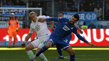 SINSHEIM, GERMANY - FEBRUARY 15: (BILD ZEITUNG OUT) Xaver Schlager of VfL Wolfsburg, Florian Grillitsch of TSG 1899 Hoffenheim during the Bundesliga match between TSG 1899 Hoffenheim and VfL Wolfsburg at PreZero-Arena on February 15, 2020 in Sinsheim, Germany. (Photo by TF-Images/Getty Images)