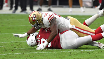 GLENDALE, AZ - OCTOBER 28: Defensive end Ronald Blair #98 of the San Francisco 49ers tackles quarterback Josh Rosen #3 of the Arizona Cardinals during the first half at State Farm Stadium on October 28, 2018 in Glendale, Arizona. (Photo by Norm Hall/Getty Images)