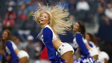 ARLINGTON, TX - SEPTEMBER 27: The Dallas Cowboys Cheerleaders perform as the Dallas Cowboys take on the Atlanta Falcons at AT
