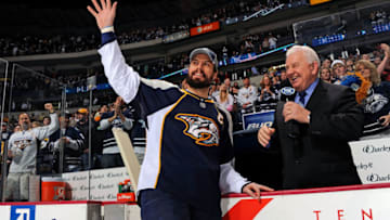 Shea Weber #6 of the Nashville Predators waves to fans while being interviewed by color analyst Terry Crisp after a game against the Columbus Blue Jackets on April 8, 2011 at the Bridgestone Arena in Nashville, Tennessee. (Photo by Frederick Breedon/Getty Images)