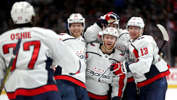 DENVER, COLORADO - FEBRUARY 13: Lars Eller #20, Nick Jensen #3, Alex Ovechkin #8 and Jakub Vrana #13 of the Washington Capitals celebrate the go ahead goal by T.J. Oshie #77 against the Colorado Avalanche in the third period at the Pepsi Center on February 13, 2020 in Denver, Colorado. (Photo by Matthew Stockman/Getty Images)