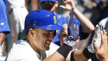 Aug 9, 2015; Seattle, WA, USA; Seattle Mariners first baseman Jesus Montero (63) is greeted in the dugout after his two-run homer against the Texas Rangers during the fourth inning at Safeco Field. Mandatory Credit: Jennifer Buchanan-USA TODAY Sports