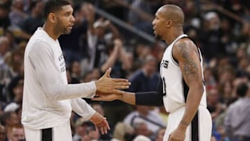 Nov 25, 2015; San Antonio, TX, USA; San Antonio Spurs power forward David West (R) celebrates a score with teammate Tim Duncan (L) during the second half against the Dallas Mavericks at AT&T Center. Mandatory Credit: Soobum Im-USA TODAY Sports
