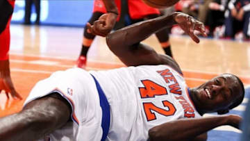 Apr. 17, 2013; New York, NY, USA; New York Knicks center Earl Barron (42) falls to the floor against the Atlanta Hawks during the second half at Madison Square Garden. Knicks won 9892. Mandatory Credit: Debby Wong-USA TODAY Sports