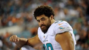 Aug 9, 2013; Jacksonville, FL, USA; Miami Dolphins defensive end Jared Odrick (98) during the game against the Jacksonville Jaguars at Everbank Field. Mandatory Credit: Melina Vastola-USA TODAY Sports