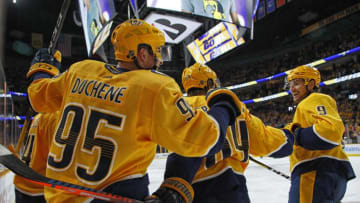 NASHVILLE, TENNESSEE - OCTOBER 10: Matt Duchene #95 of the Nashville Predators is congratulated by teammates Mikael Granlund #64 and Filip Forsberg #9 after scoring his first goal as a member of the Nashville Predators against the Washington Capitals during the third period of a 6-5 Predators victory over the Capitals at Bridgestone Arena on October 10, 2019 in Nashville, Tennessee. (Photo by Frederick Breedon/Getty Images)