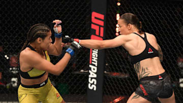 ABU DHABI, UNITED ARAB EMIRATES - OCTOBER 04: (R-L) Germaine de Randemie of The Netherlands punches Julianna Pena in their women's bantamweight bout during the UFC Fight Night event inside Flash Forum on UFC Fight Island on October 04, 2020 in Abu Dhabi, United Arab Emirates. (Photo by Josh Hedges/Zuffa LLC)