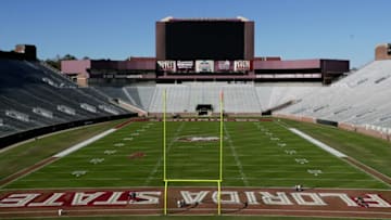 A crew paints Bobby Bowden Field at Doak Campbell Stadium Monday, Dec. 2, 2019.Doak Painting 120219 Ts 046