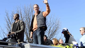 Feb 9, 2016; Denver, CO, USA; Denver Broncos quarterback Peyton Manning (18) waves to the crowd during the Super Bowl 50 championship parade at Civic Center Park. Mandatory Credit: Ron Chenoy-USA TODAY Sports