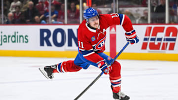 Nov 22, 2022; Montreal, Quebec, CAN; Montreal Canadiens right wing Brendan Gallagher (11) shoots the puck against the Buffalo Sabres during the first period at Bell Centre. Mandatory Credit: David Kirouac-USA TODAY Sports