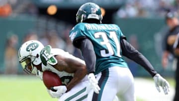 Sep 27, 2015; East Rutherford, NJ, USA; New York Jets wide receiver Brandon Marshall (15) makes a catch in front of Philadelphia Eagles defensive back Byron Maxwell (31) during the second quarter at MetLife Stadium. Mandatory Credit: Brad Penner-USA TODAY Sports