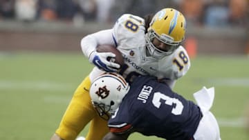 Oct 3, 2015; Auburn, AL, USA; San Jose State Spartans tight end Billy Freeman (18) is tackled by Auburn Tigers defensive back Jonathan Jones (3) during the third quarter at Jordan Hare Stadium. The Tigers beat the Spartans 35-21. Mandatory Credit: John Reed-USA TODAY Sports