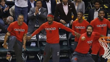 Apr 29, 2016; Indianapolis, IN, USA; The Toronto Raptors player celebrate on the bench after scoring against the Indiana Pacers during the first quarter in game six of the first round of the 2016 NBA Playoffs at Bankers Life Fieldhouse. Mandatory Credit: Brian Spurlock-USA TODAY Sports