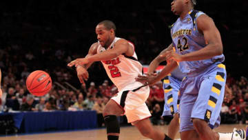 NEW YORK, NY - MARCH 10: Preston Knowles #2 of the Louisville Cardinals dribbles past Chris Otule #42 of the Marquette Golden Eagles during the quarterfinals of the 2011 Big East Men's Basketball Tournament presented by American Eagle Outfitters at Madison Square Garden on March 10, 2011 in New York City. (Photo by Chris Trotman/Getty Images)