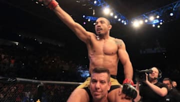 Jose Aldo and Andre Pederneiras (Photo by Jeff Bottari/Zuffa LLC)