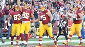 Dec 20, 2015; Landover, MD, USA; Washington Redskins tight end Jordan Reed (86) celebrates with tight end Alex Smith (83) after scoring a touchdown against the Buffalo Bills during the first half at FedEx Field. Mandatory Credit: Brad Mills-USA TODAY Sports