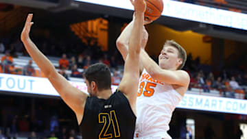 SYRACUSE, NY - OCTOBER 25: Buddy Boeheim #35 of the Syracuse Orange shoots the ball against the defense of Jeff Allen #21 of the St. Rose Golden Knights during the second half at the Carrier Dome on October 25, 2018 in Syracuse, New York. Syracuse defeated St. Rose 80-49. (Photo by Rich Barnes/Getty Images)
