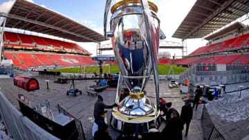 Dec 9, 2016; Toronto, Ontario, USA; Stadium workers position a giant replica of the MLS Cup trophy after training sessions in preparations for the MLS Cup final between Seattle Sounders and Toronto FC at BMO Field. Mandatory Credit: Dan Hamilton-USA TODAY Sports