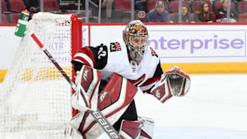 GLENDALE, AZ - NOVEMBER 25: Antti Raanta #32 of the Arizona Coyotes gets ready to make a save against the Calgary Flames at Gila River Arena on November 25, 2018 in Glendale, Arizona. (Photo by Norm Hall/NHLI via Getty Images)