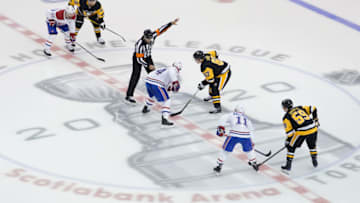 TORONTO, ONTARIO - AUGUST 03: Sidney Crosby #87 of the Pittsburgh Penguins gets set to face-off against Phillip Danault #24 of the Montreal Canadiens in Game Two of the Eastern Conference Qualification Round prior to the 2020 NHL Stanley Cup Playoffs at Scotiabank Arena on August 03, 2020 in Toronto, Ontario. (Photo by Andre Ringuette/Freestyle Photo/Getty Images)
