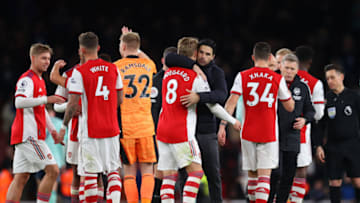 LONDON, ENGLAND - MARCH 13: Mikel Arteta, Manager of Arsenal embraces Martin Odegaard of Arsenal following victory in the Premier League match between Arsenal and Leicester City at Emirates Stadium on March 13, 2022 in London, England. (Photo by Catherine Ivill/Getty Images)
