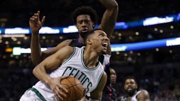 Feb 10, 2016; Boston, MA, USA; Boston Celtics guard Evan Turner (11) drives the ball against Los Angeles Clippers center DeAndre Jordan (6) in the second half at TD Garden. Celtics defeated the Clippers in overtime 139-134. Mandatory Credit: David Butler II-USA TODAY Sports