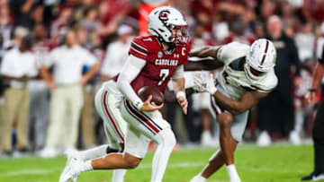 Sep 23, 2023; Columbia, South Carolina, USA; South Carolina Gamecocks quarterback Spencer Rattler (7) scrambles against the Mississippi State Bulldogs in the second quarter at Williams-Brice Stadium. Mandatory Credit: Jeff Blake-USA TODAY Sports