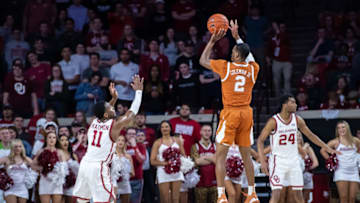 Mar 3, 2020; Norman, Oklahoma, USA; Texas Longhorns guard Matt Coleman III (2) shoots the ball over Oklahoma Sooners guard De'Vion Harmon (11) during the second half at Lloyd Noble Center. Mandatory Credit: Rob Ferguson-USA TODAY Sports