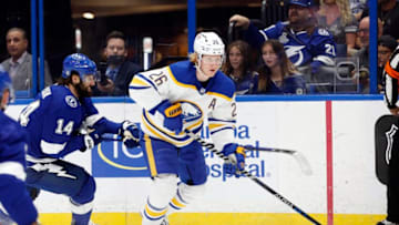 Apr 10, 2022; Tampa, Florida, USA; Tampa Bay Lightning left wing Pat Maroon (14) defends Buffalo Sabres defenseman Rasmus Dahlin (26) during the first period at Amalie Arena. Mandatory Credit: Kim Klement-USA TODAY Sports
