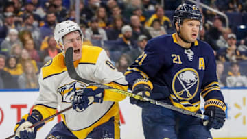 NASHVILLE, TN - MARCH 19: Kyle Turris #8 of the Nashville Predators battles against Kyle Okposo #21 of the Buffalo Sabres during an NHL game at KeyBank Center on March 19, 2018 in Buffalo, New York. (Photo by John Russell/NHLI via Getty Images)