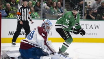 Oct 3, 2023; Dallas, Texas, USA; Dallas Stars center Craig Smith (15) attempts to direct the puck past Colorado Avalanche goaltender Justus Annunen (60) during the second period at the American Airlines Center. Mandatory Credit: Jerome Miron-USA TODAY Sports