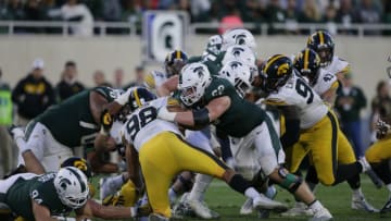 EAST LANSING, MI - SEPTEMBER 30: Offensive tackle Luke Campbell #62 of the Michigan State Spartans blocks defensive end Anthony Nelson #98 of the Iowa Hawkeyes during the second half at Spartan Stadium on September 30, 2017 in East Lansing, Michigan. (Photo by Duane Burleson/Getty Images)