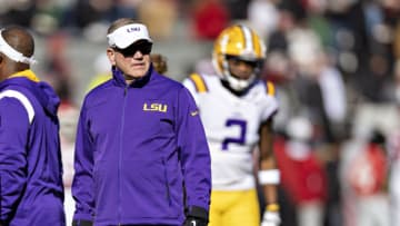FAYETTEVILLE, ARKANSAS - NOVEMBER 12: Head Coach Brian Kelly of the LSU Tigers watches his team warm up before a game against the Arkansas Razorbacks at Donald W. Reynolds Razorback Stadium on November 12, 2022 in Fayetteville, Arkansas. The Tigers defeated the Razorbacks 13-10. (Photo by Wesley Hitt/Getty Images)