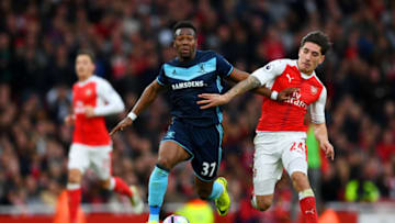 LONDON, ENGLAND - OCTOBER 22: Hector Bellerin of Arsenal (R) tackles Adama Traore of Middlesbrough (L) during the Premier League match between Arsenal and Middlesbrough at the Emirates Stadium on October 22, 2016 in London, England. (Photo by Shaun Botterill/Getty Images)