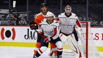 Apr 17, 2021; Philadelphia, Pennsylvania, USA; Washington Capitals defenceman Nick Jensen (3) defends Philadelphia Flyers right wing Wade Allison (57) in the second period at Wells Fargo Center. Mandatory Credit: Kyle Ross-USA TODAY Sports